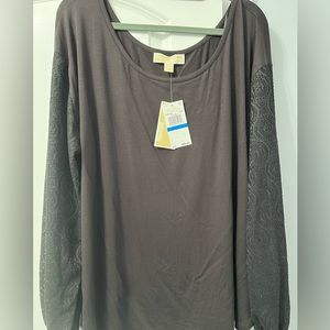 Michael Kors black top with sheer lace sleeves. New with tags.